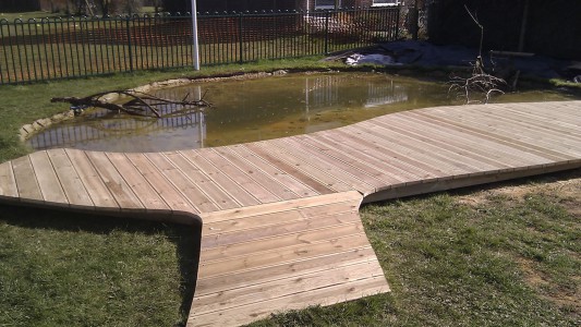 school deck and pond