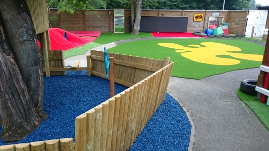 Outdoor blackboards, mirrors, fun soft play surfacing, tunnels and mounds